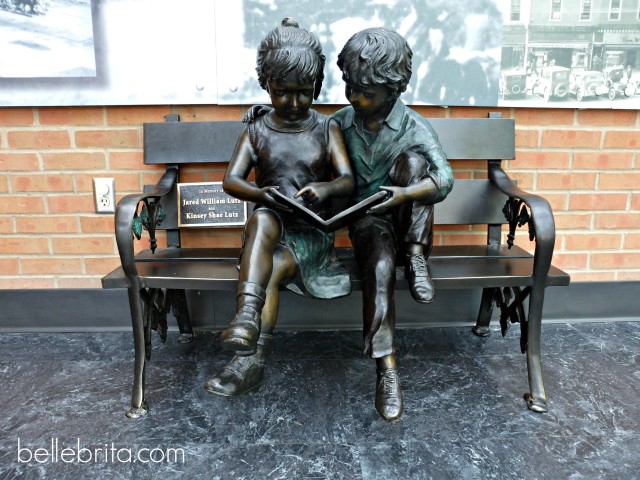 Findlay Library statue of kids reading