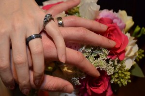 Our wedding bands and engagement ring with my bridal bouquet!