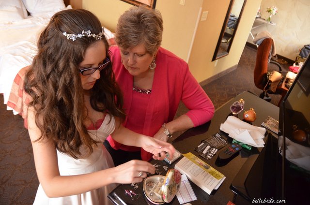 My mom helped me pick out what earrings I should wear on my wedding day