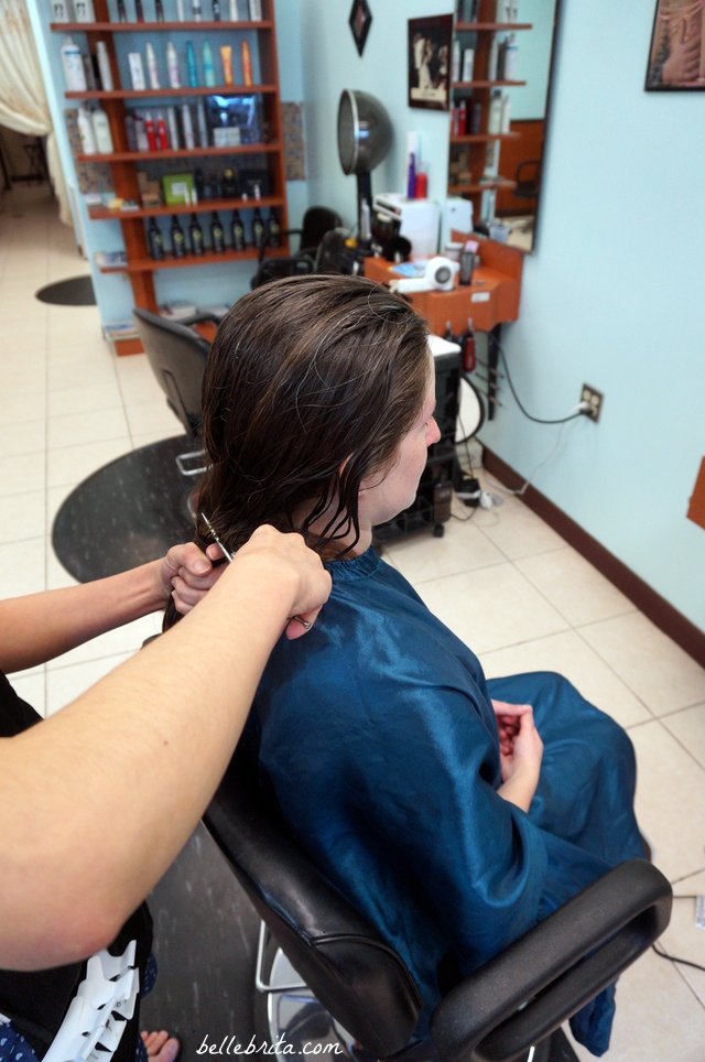 The first snip! 10 inches donated for cancer wigs. | Belle Brita