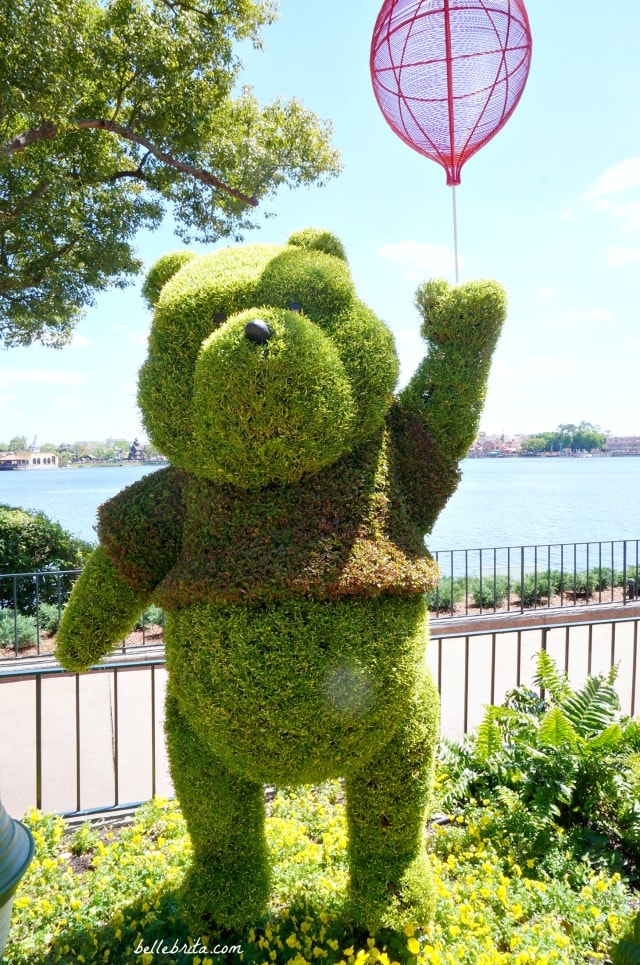 Pooh Bear, Winnie-the-Pooh Bear! This snuggly topiary was in EPCOT's United Kingdom during the 2018 Flowers and Garden Festival. | Belle Brita