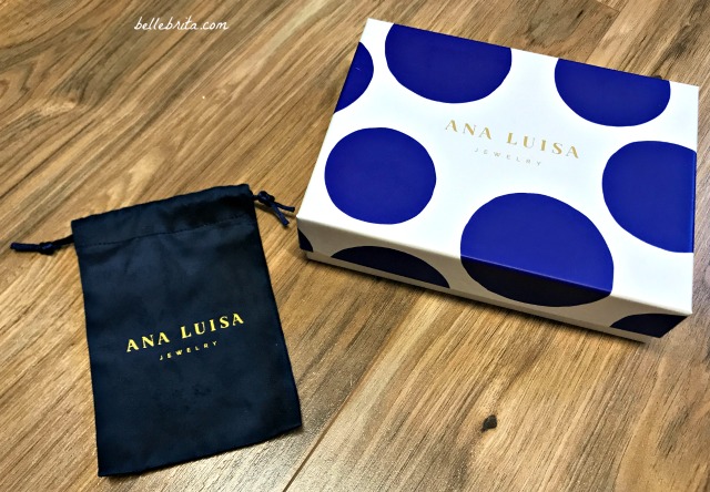 Ana Luisa jewelry comes in a navy blue velvet pouch, tucked inside a blue and white gift box. | Belle Brita