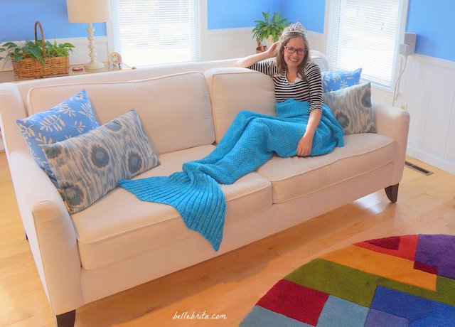 A mermaid blanket is the perfect Christmas present for anyone who wants to cuddle up by the fire this winter. | Belle Brita