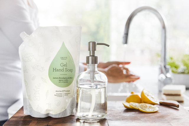 Ready to make simple sustainable changes this year? Start using a refillable hand soap dispenser like this beautiful glass bottle from Grove Collaborative! | Belle Brita