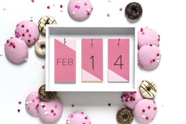 February 14, Valentine's Day, pink cookies, frosted donuts flat lay