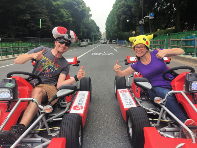 Man and woman in go-karts