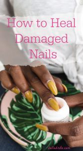 Close-up of black woman's manicure. Text overlay reads: "How to Heal Damaged Nails"
